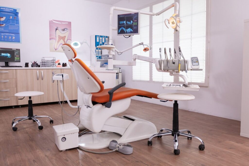 empty room with dental instruments and tooth radiography images